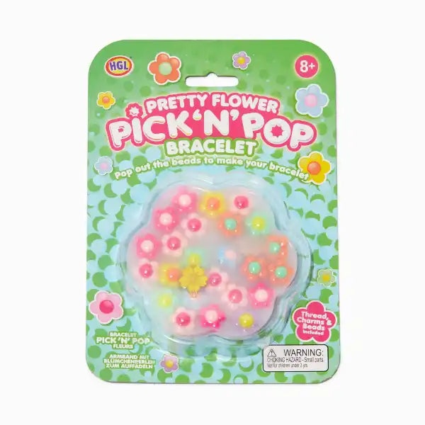 Flower-shaped beads in pink, orange, and yellow inside a clear blister pack on a green floral patterned card.