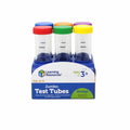 Six clear jumbo test tubes with colorful lids and measurement lines in a blue stand with retail box packaging.