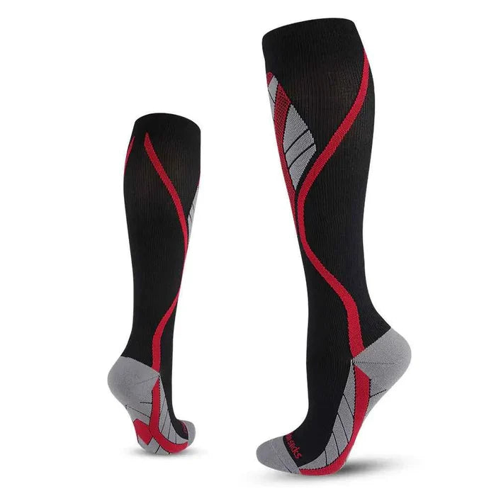 Black and red professional long leg compression socks for cycling by Mead's Supply & Equipment, made of nylon anti-friction performance material.