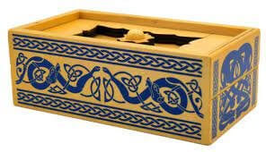 Rectangular wooden puzzle box with blue Celtic sea serpent designs and a sliding lid featuring a gold knob.