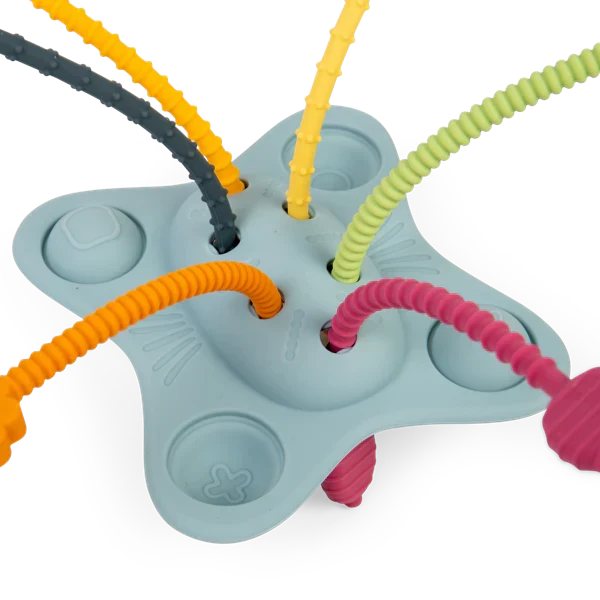 Blue silicone star-shaped sensory toy with colorful textured pull strings and integrated pop buttons.