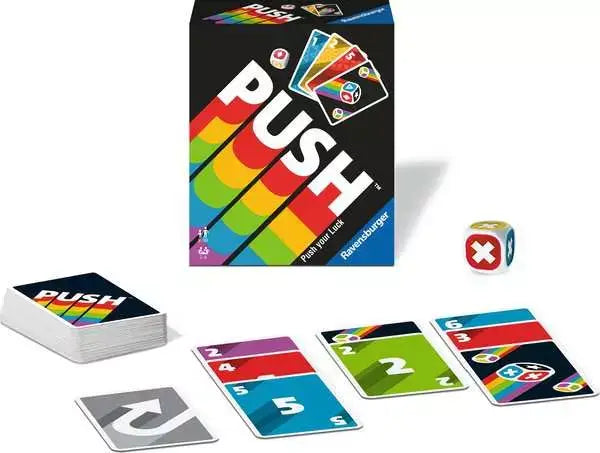 Black card game box with rainbow stripes, scattered colorful numbered cards, and a white die with a red X.