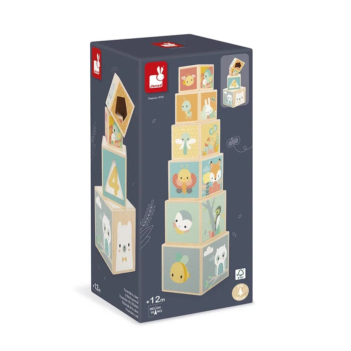 Janod box showing six wooden nesting blocks with pastel animal illustrations like an owl, fox, and penguin.