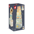 Janod box showing six wooden nesting blocks with pastel animal illustrations like an owl, fox, and penguin.