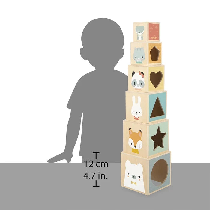 Six wooden stacking blocks with pastel animal faces and shape cutouts, shown in a tower beside a child silhouette.