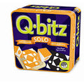 Square purple tin with orange trim showing lime green text and orange and black patterned game cubes in a tray.