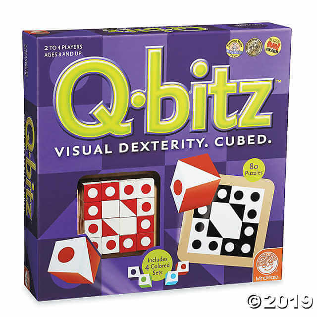 Purple Q-Bitz game box featuring patterned red and black wooden cubes and bright green lettering.