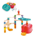 Wooden marble run with colorful blocks and curved tracks, built using a red storage bucket and teal lid as a base.