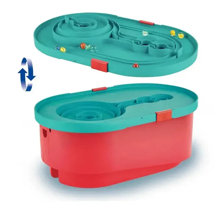 Red storage bucket with a teal marble run lid that flips over to reveal tracks, spirals, and colorful marbles.