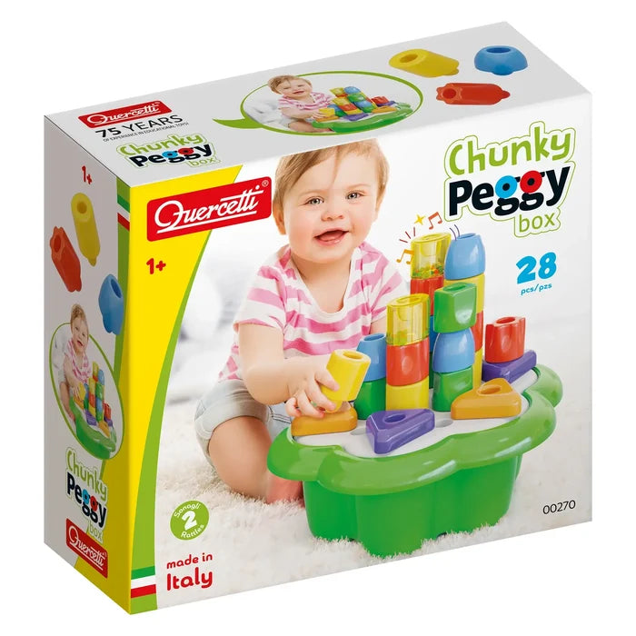 Toy box featuring a baby playing with colorful, chunky stacking pegs and shapes on a green flower-shaped base.