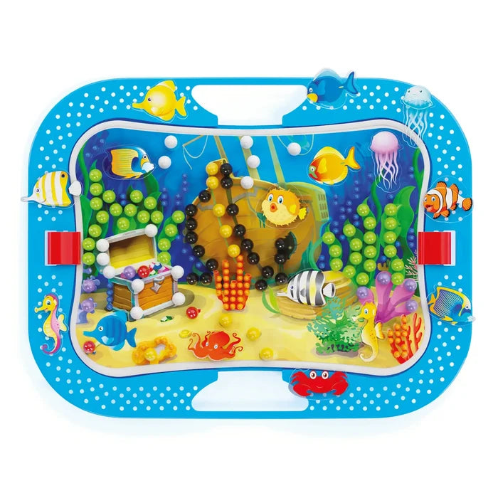 Blue portable pegboard featuring an underwater scene with a shipwreck, colorful pegs, and sea creature stickers.