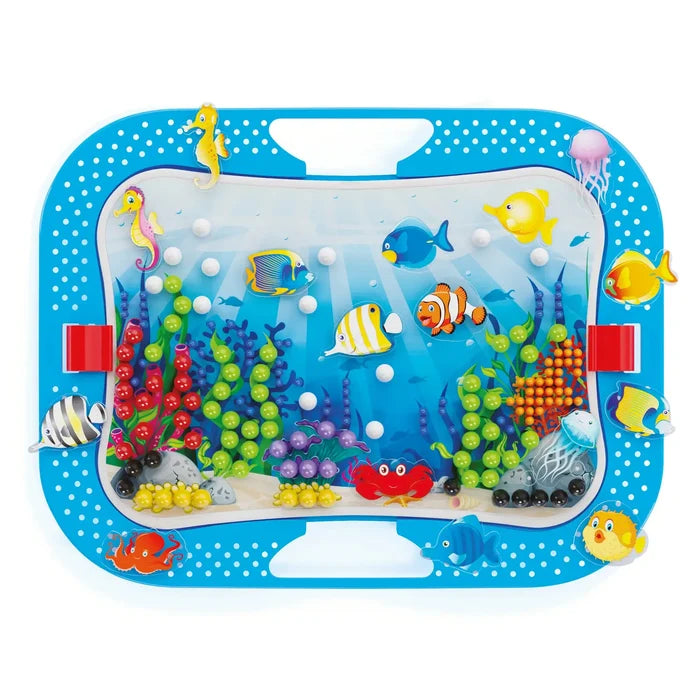 Blue polka-dot carrying case with an underwater pegboard scene featuring colorful fish and sea creature pegs.