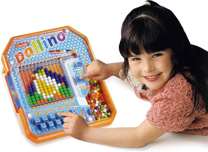 Girl playing with an orange marble mosaic toy, pressing blue buttons to arrange colored beads into a pattern.