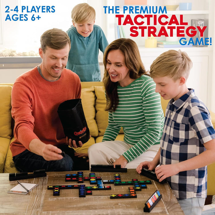 Family playing a board game with black tiles and colorful shapes. Text: 2-4 players, ages 6+, tactical strategy game.