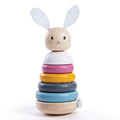 Wooden stacking toy with a rabbit head, felt ears, and colorful rings in white, pink, yellow, grey, and blue.