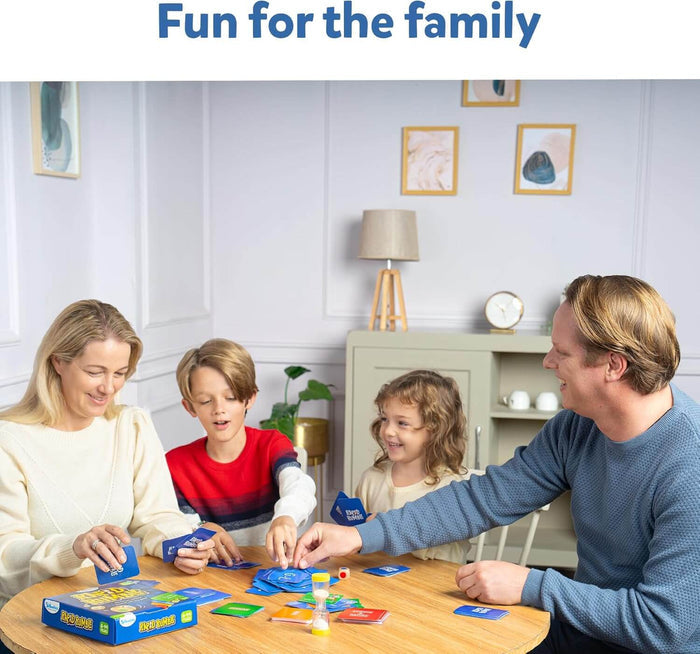 Family playing a board game with blue cards, a yellow sand timer, and red die on a round wooden table.