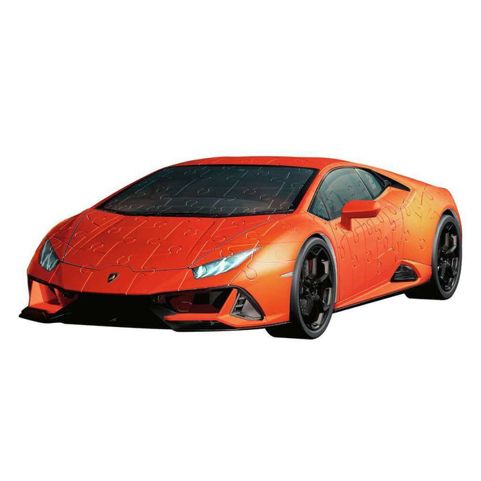 3D puzzle model of a bright orange Lamborghini Huracan sports car with visible jigsaw piece outlines.