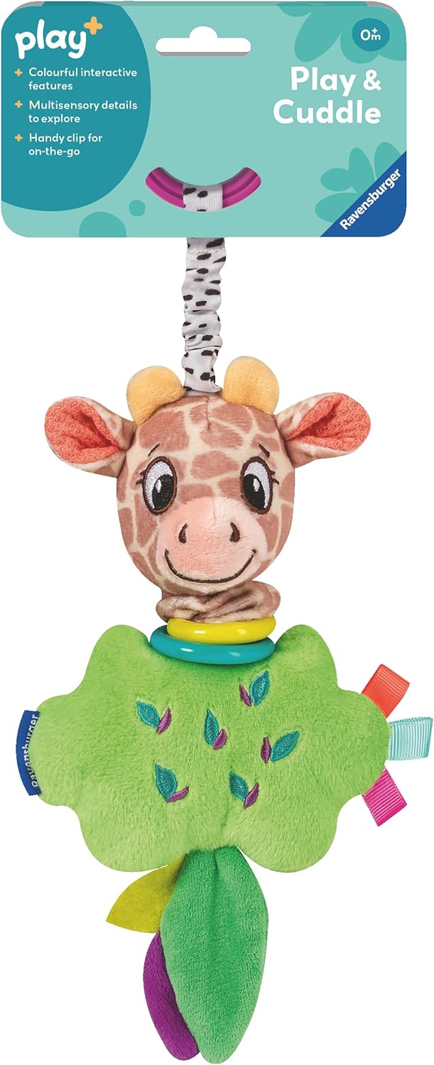 Plush giraffe toy with a spotted strap, green cloud body, and colorful tags on teal packaging.