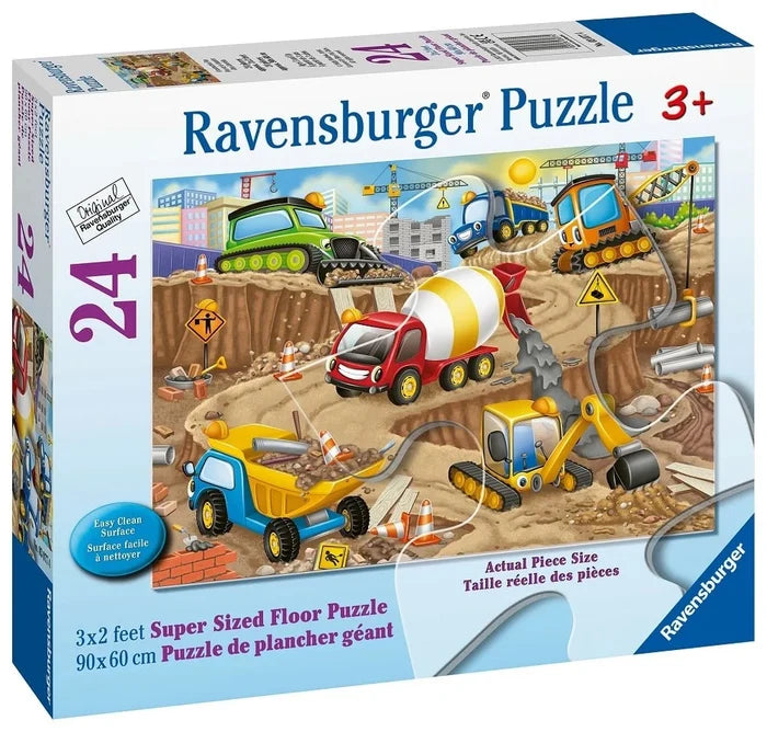White box for a 24-piece floor puzzle for ages 3+ showing cartoon construction vehicles with faces at a busy site.