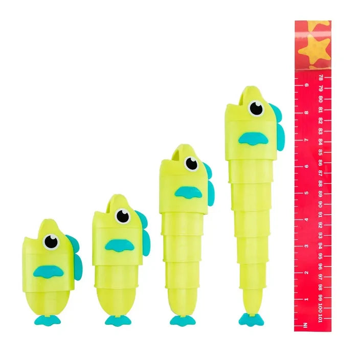 Four lime green, segmented plastic fish toys in graduated sizes shown next to a red ruler for scale.