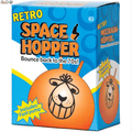 Blue box showing an orange inflatable hopper with a grinning cartoon face and handles. Includes a foot pump.