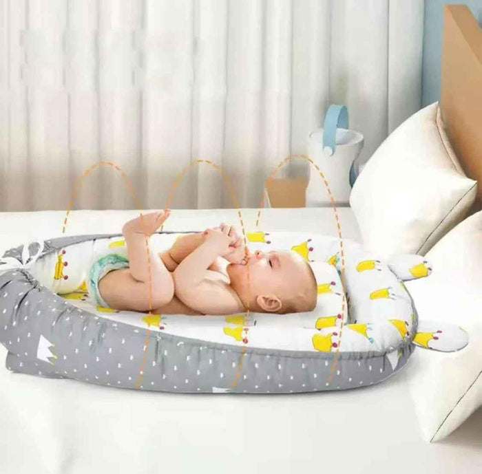 Reversible baby lounger by Baby Way NZ with pillow, adjustable portable baby bed and bassinet, ideal for travel and naps.