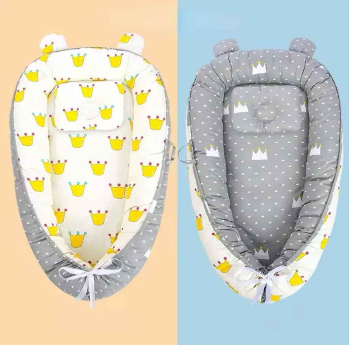 Reversible baby lounger with pillow from Baby Way NZ, portable adjustable bassinet designed for comfortable sleep and travel.