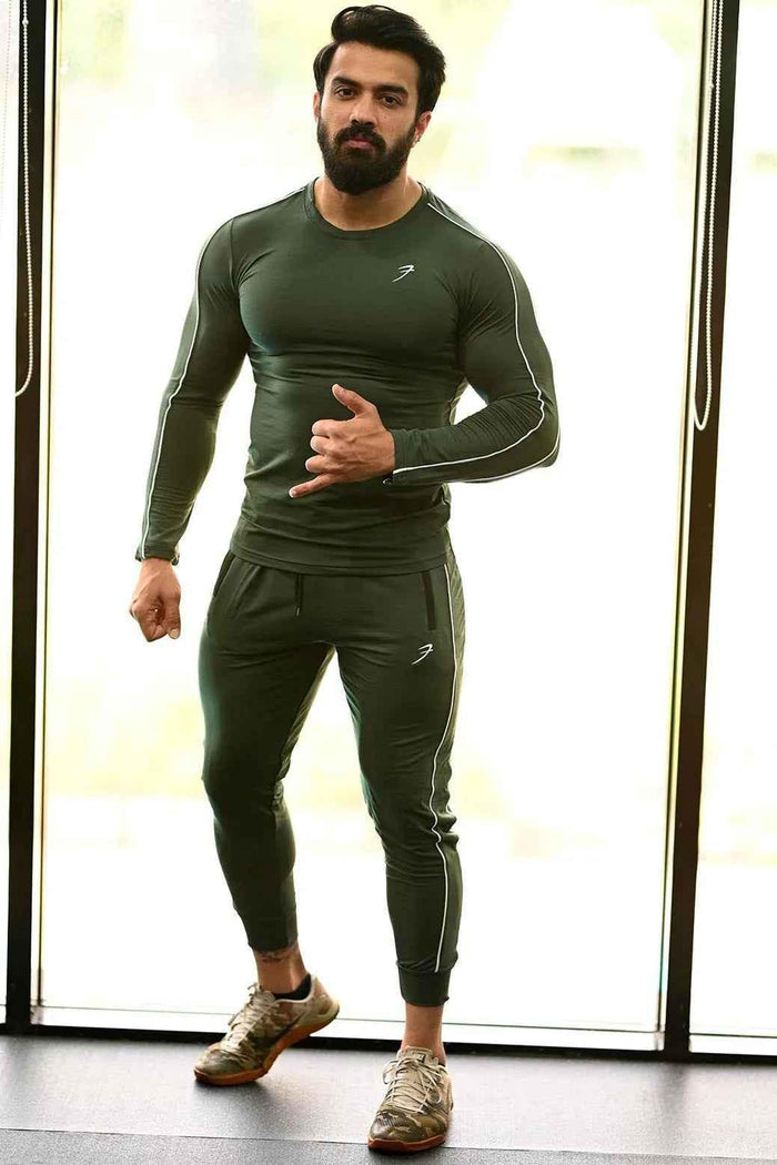 Green Revival Piping Fullsleeves T-shirt by Fuaark Nz, featuring piping details and a casual full-sleeve design.