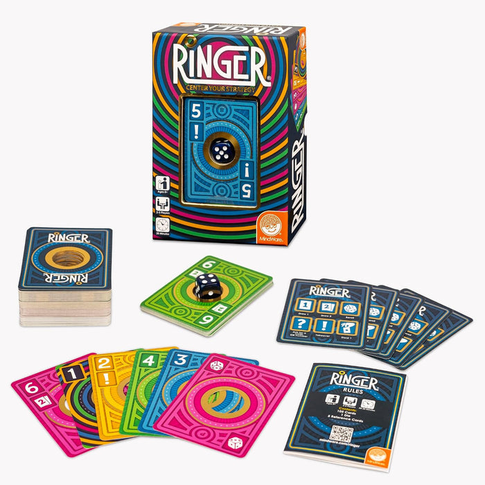 Ringer game box with concentric ring patterns, colorful cards with center cutouts, a die, and a rulebook.