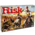 Risk board game box showing a Napoleonic battle scene with soldiers on horseback, a cannon, and a bold red title.
