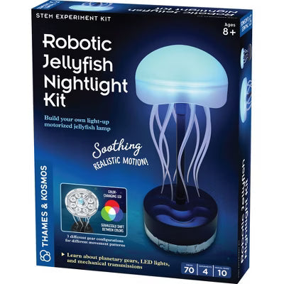 STEM kit box featuring a glowing blue translucent jellyfish lamp with long wavy tentacles on a black base.