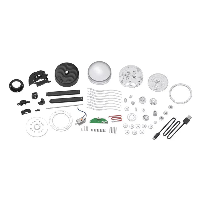 Assorted DIY kit parts: a clear dome, motor, circuit boards, wires, gears, and USB cable on a white background.