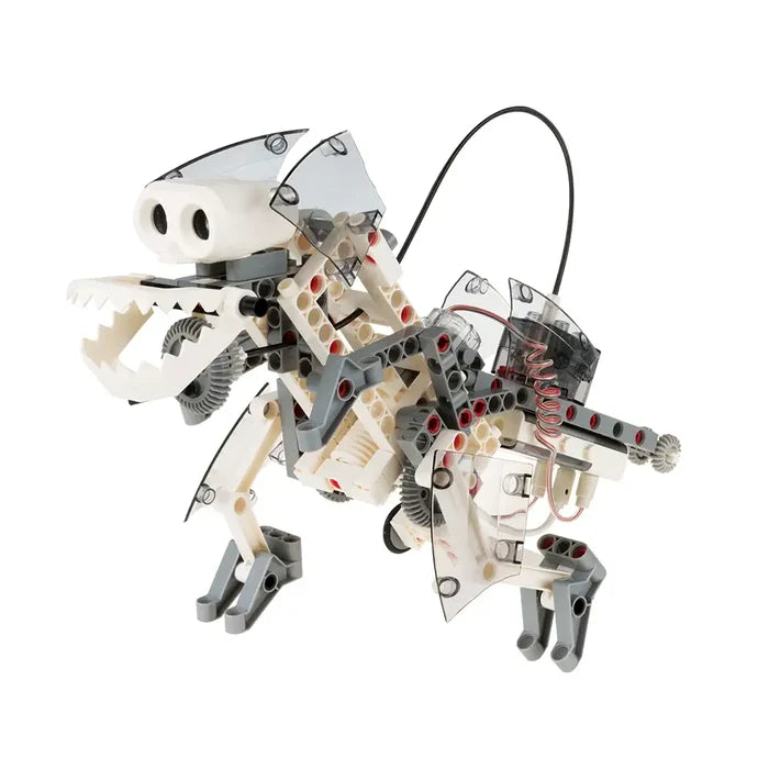 White and grey robotic dinosaur toy with visible gears, translucent plastic panels, and a sensor head.