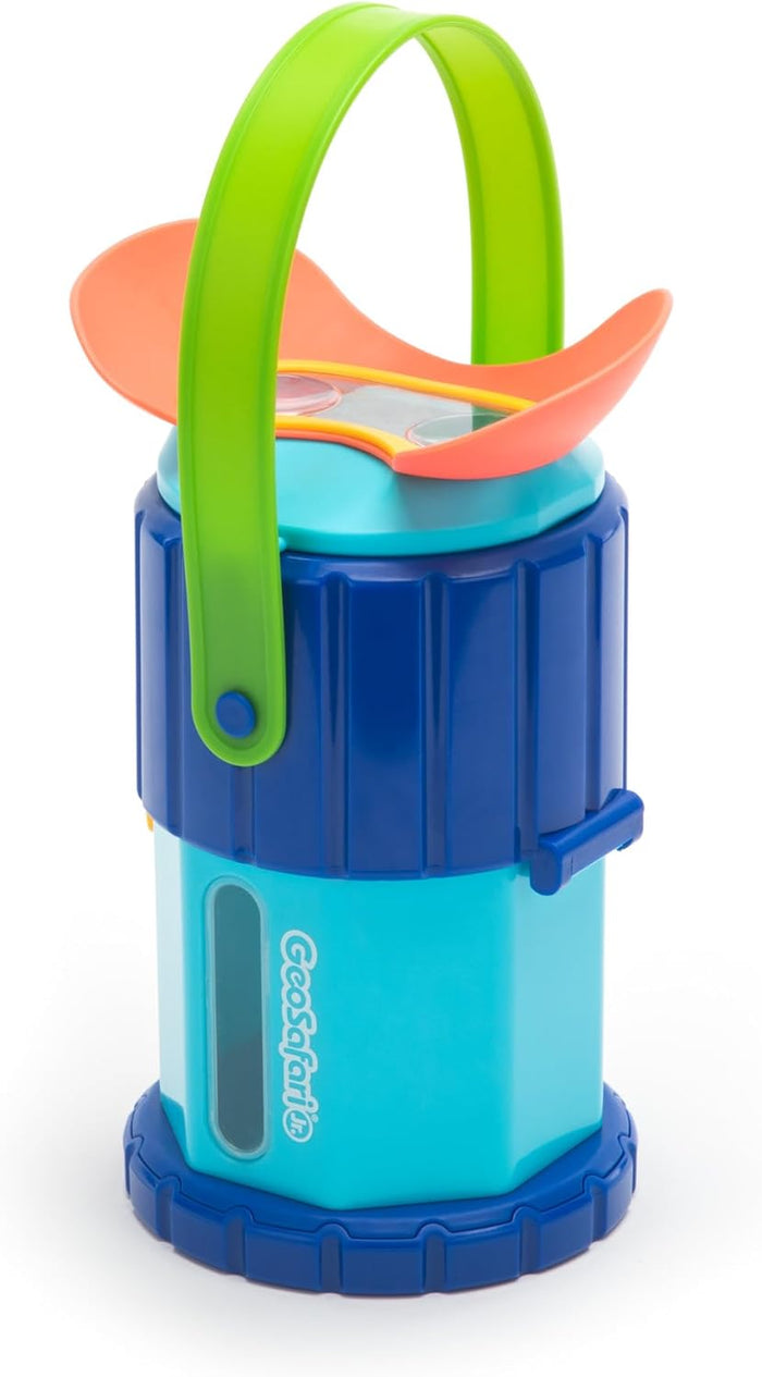 Teal and navy blue toy viewer with a large green handle, orange binocular eyepiece, and GeoSafari Jr. logo.