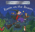 Blue book cover: A witch flies a broom with a cat, cauldron, and star wand over a forest under a starry night sky.