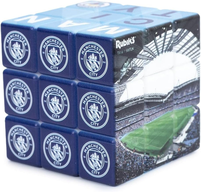 A 3x3 Rubik's Cube featuring Manchester City FC crests, a stadium photo, and light blue 'MAN CITY' lettering.