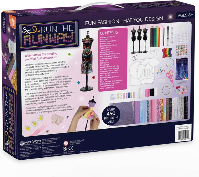 Back of purple fashion design kit box showing over 450 pieces including mini mannequins, tools, and fabric swatches.