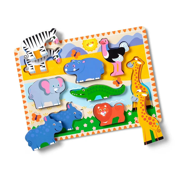 Colorful wooden puzzle with chunky safari animal pieces like a giraffe and zebra over a painted landscape.