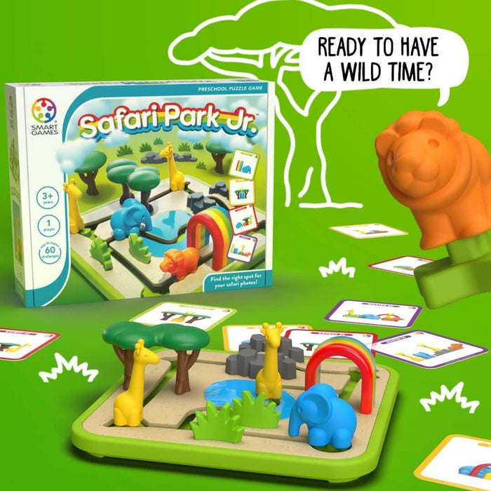 Safari Park Jr. game box and board featuring colorful plastic animals, a rainbow arch, and cards on a green background.