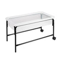 Rectangular translucent white tub on a black metal stand with two wheels and two legs.