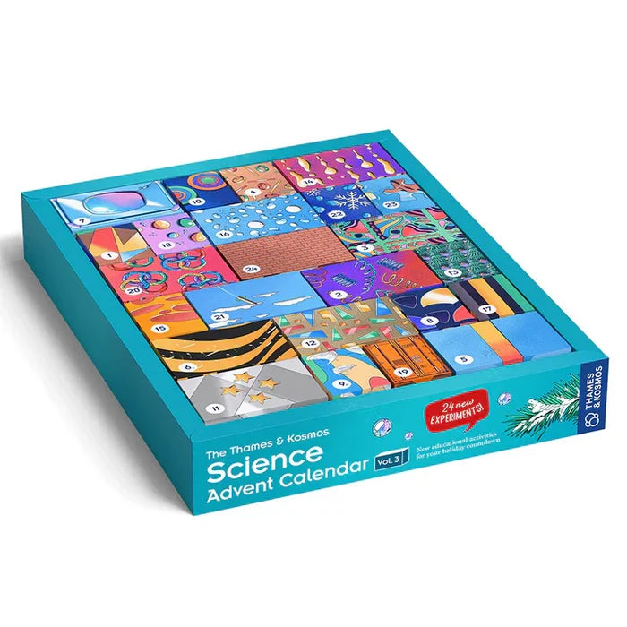 Teal advent calendar box with 24 numbered doors featuring colorful abstract patterns and scientific illustrations.