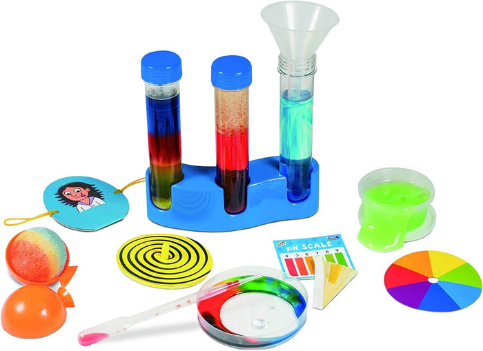 Kids' science kit with colorful test tubes, green slime, a pH scale, petri dish, and experiment tools.