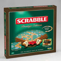 Scrabble Prestige Edition box with wood-grain trim and green face illustrating the rotating board and wooden tiles.