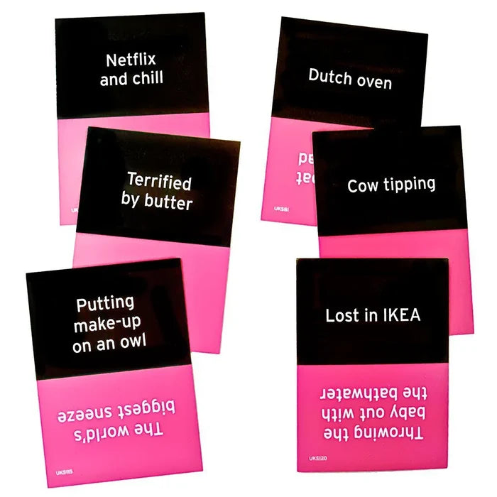 Eight black and pink game cards featuring funny prompts like Netflix and chill, Cow tipping, and Dutch oven.