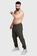 Fuaark Nz Army Script Cargo Joggers featuring multiple pockets, comfortable fit, and military-inspired design, shown in dark green fabric.