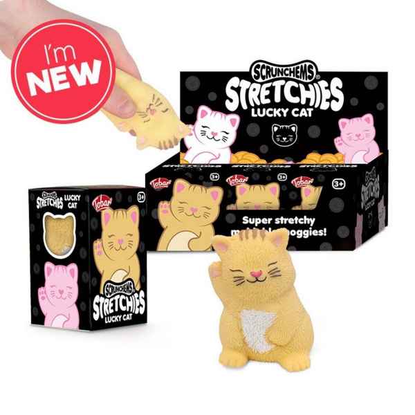 Yellow squishy lucky cat toy shown with its black display box and being stretched by a hand.
