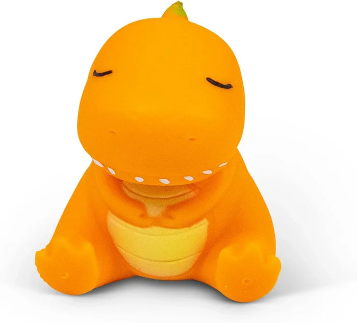 Orange dinosaur squishy toy with its eyes closed, short limbs, a yellow belly, and a small green tail spike.