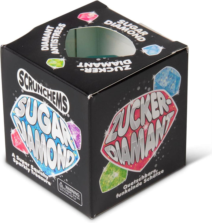 Black box with vibrant blue and pink diamond illustrations and a circular viewing hole on top.