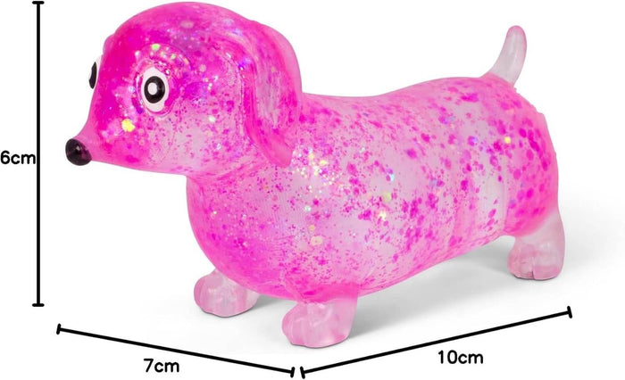 Pink glittery squishy sausage dog toy with big eyes, labeled as 6cm high, 7cm wide, and 10cm long.