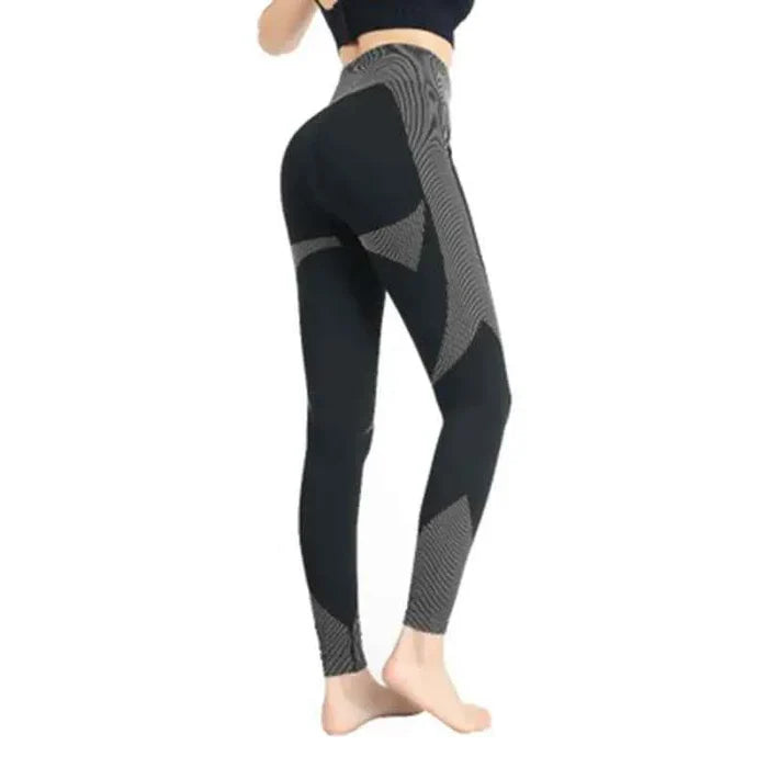 Black seamless hollow yoga pants for women by Mead's Supply & Equipment Outfitters, moisture-wicking and breathable athletic leggings